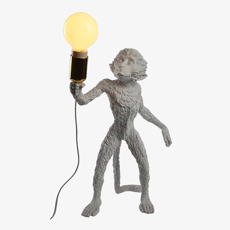 Lámpara de cabecera o escritorio con mono de piedra