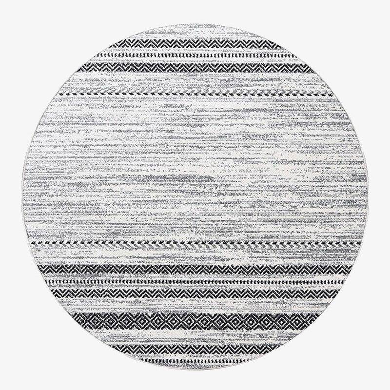 Tapis rond gris et noir aux motifs géométriques Nordic