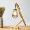 Lampe de bureau ou chevet avec pied en bois et lampe en cage métal