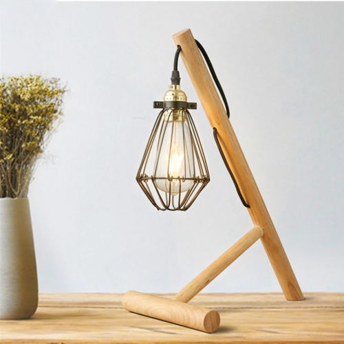 Desk or bedside lamp with wooden foot and metal cage lamp