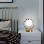 Lampe à poser design LED en métal doré Nuria