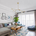 Lustre design doré avec boules de verre Lindsey