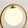 Lampe à poser design LED en métal doré Nuria