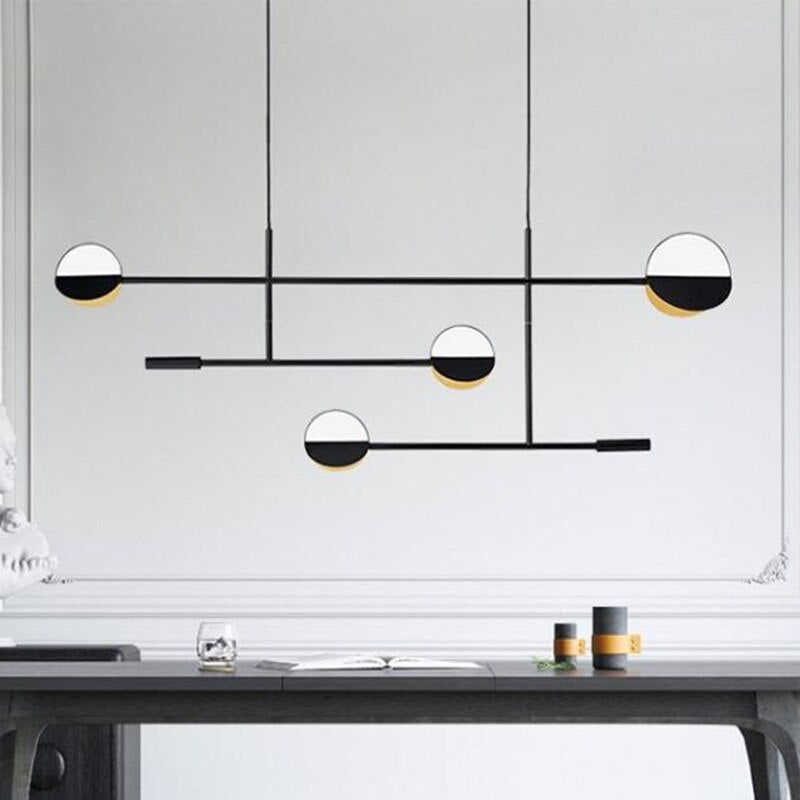 Design and minimalist gold chandelier with circular forms Zev