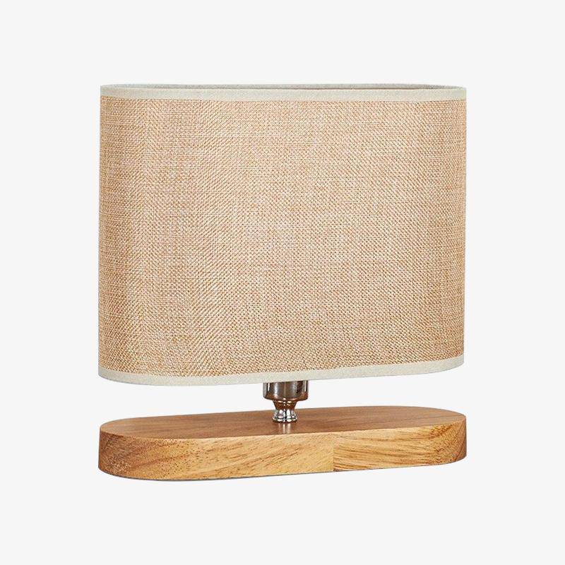Wooden bedside lamp and lampshade in oval fabric