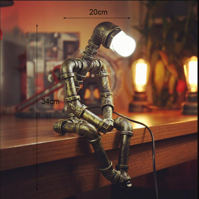 Industrial LED table lamp Nile metal robotic figure