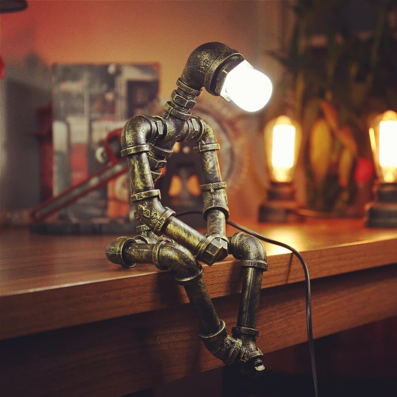 Industrial LED table lamp Nile metal robotic figure