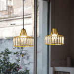 Suspension design avec abat-jour en verre ambré Cloarec