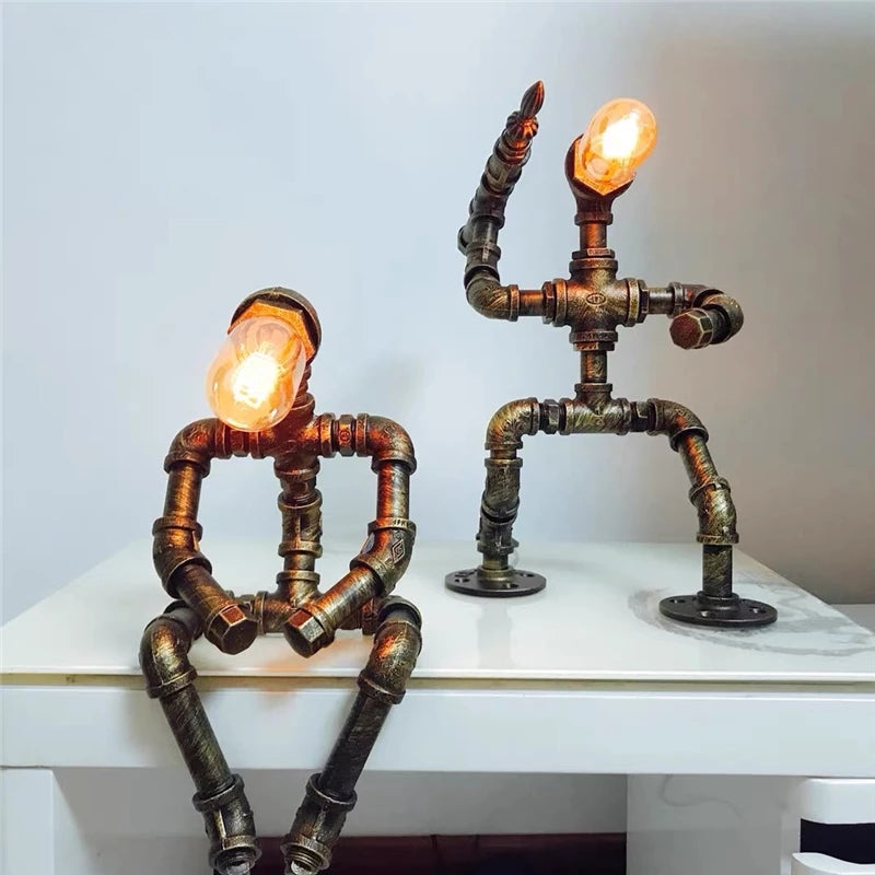 Industrial LED table lamp Nile metal robotic figure