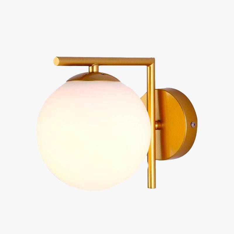 wall lamp design with golden branch and glass ball