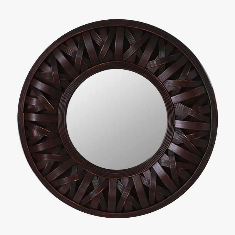 Round decorative wall mirror in woven dark wood