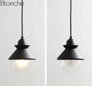 Suspension LED design triangle en métal et boule en verre