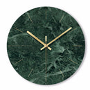 Horloge murale ronde design en verre style marbre vert et détails dorés 30cm