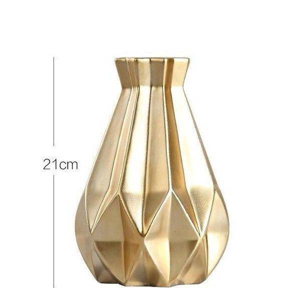 Design vase in gold-plated metal with geometric shapes Luxury