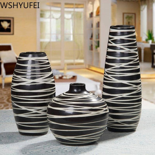 Design vase in black ceramic with zebra pattern