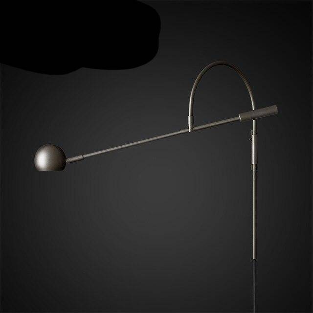 wall lamp Design LED wall lamp in gold with rounded metal shaft Shake