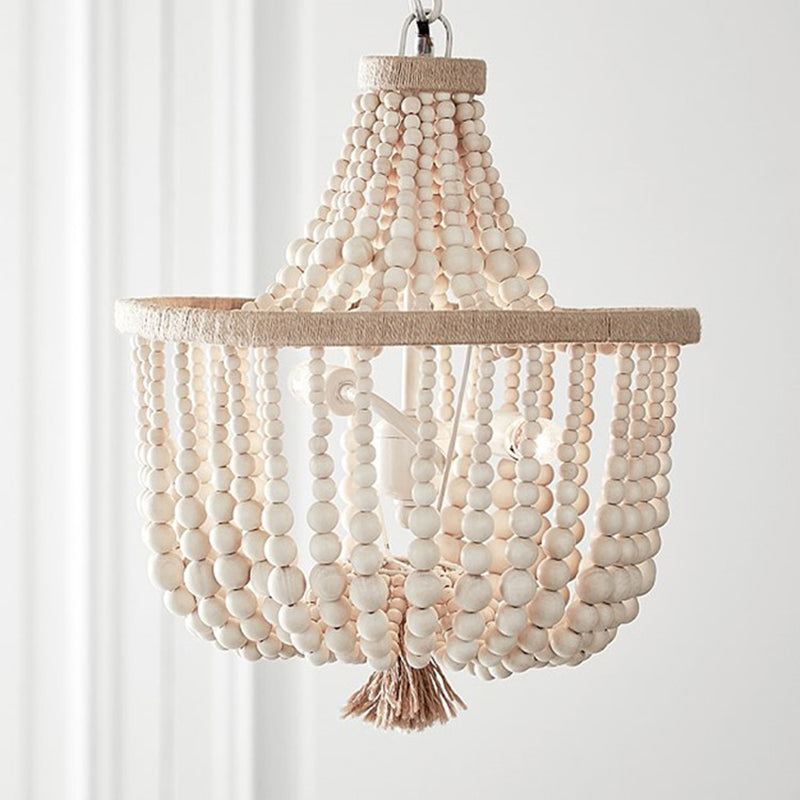 Scandinavian basket chandelier with strung beads Brunissende