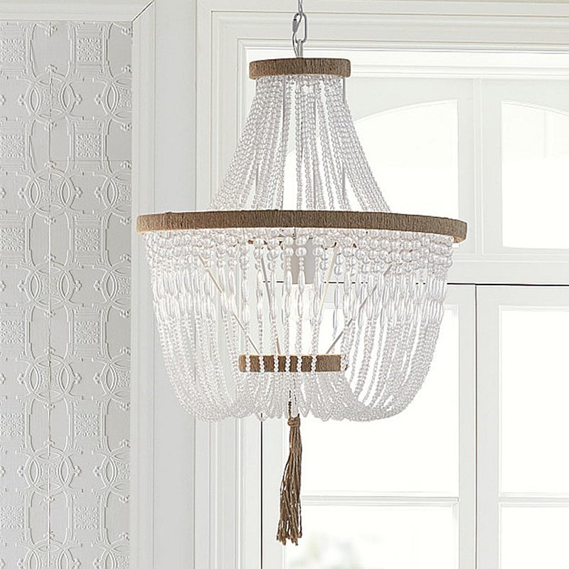 Scandinavian basket chandelier with strung beads Brunissende