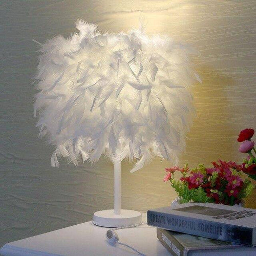 LED table lamp with coloured feathers