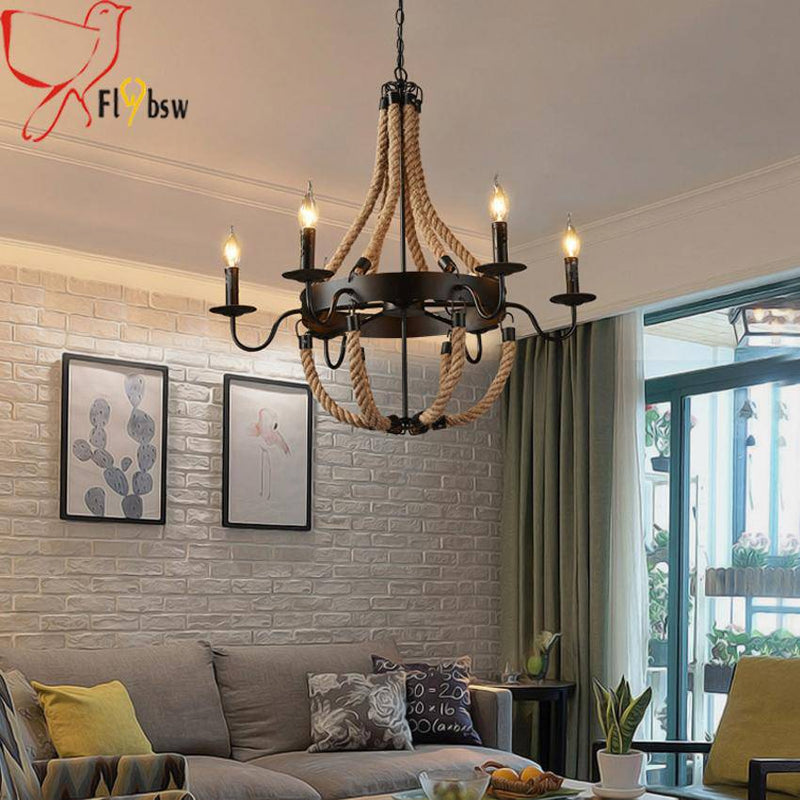 Rustic metal and rope chandelier with flame lamps