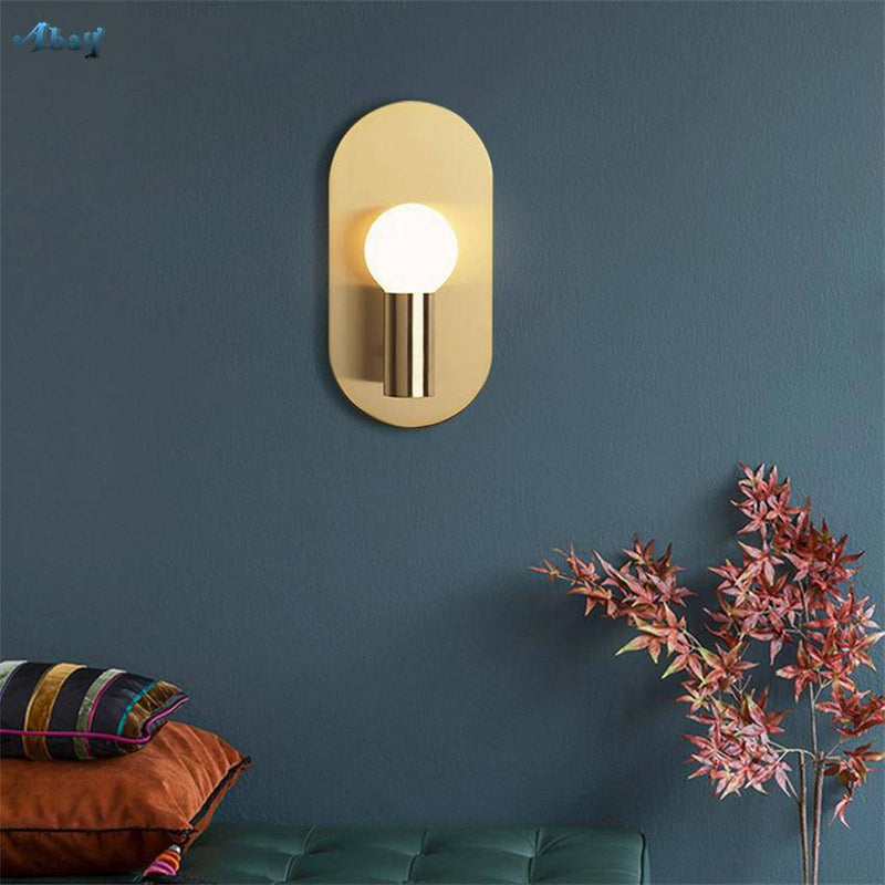 Lámpara de pared design LED en metal redondeado dorado Sconce
