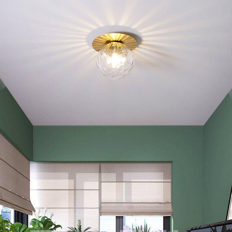 Plafonnier LED design rond doré avec boule en verre Porch