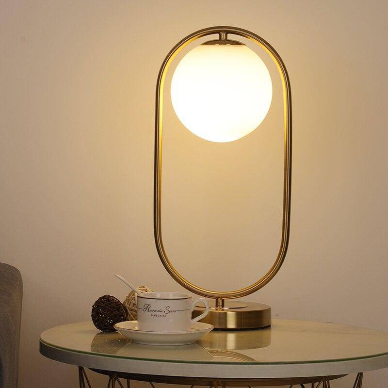 LED design table lamp with metal ring and glass ball Chao