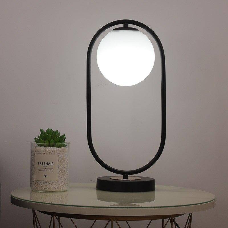 LED design table lamp with metal ring and glass ball Chao