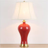 Retro LED bedside lamp in red ceramic Dohia