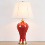 Retro LED bedside lamp in red ceramic Dohia