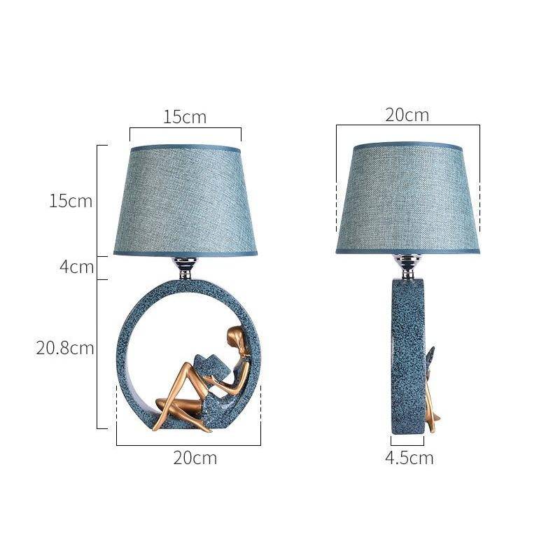 LED table lamp with sculpture-like body and lampshade fabric