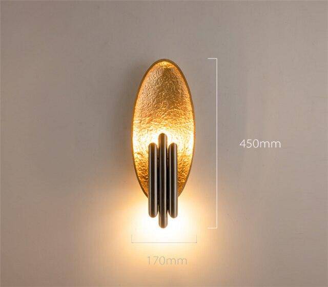 Lámpara de pared design LED con bola metálica redondeada y tubo dorado Rui