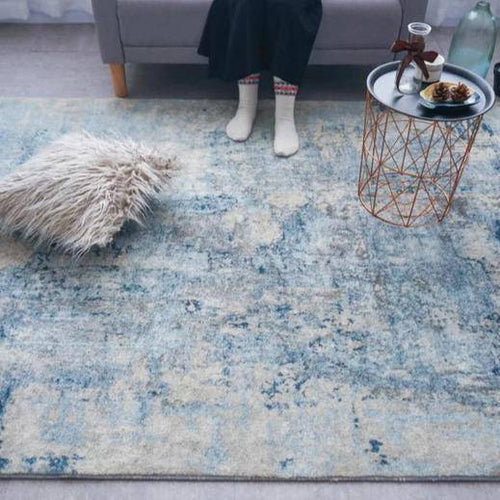 Tapis moderne rectangle au style abstrait beige et bleu