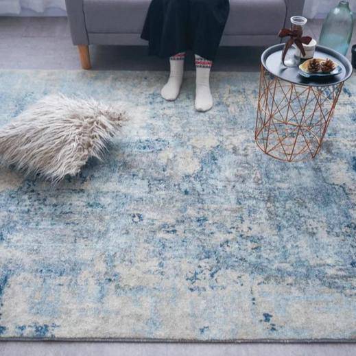 Modern rectangle rug in beige and blue abstract style