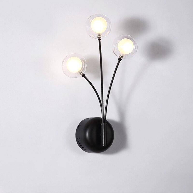 Aplique design LED negro con tres bolas de cristal Hotel