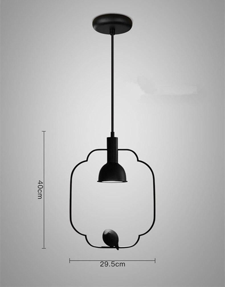 Lámpara de suspensión industrial con pájaro posado Pájaro