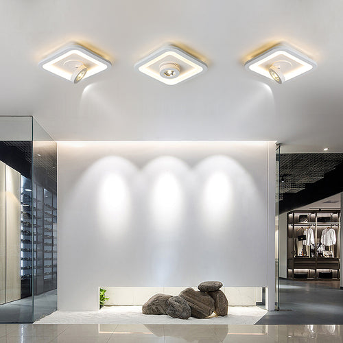 Plafonnier design LED avec spot réglable et base lumineuse Wrenn