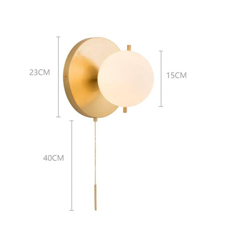 Applique murale moderne LED avec boule en verre et socle circulaire doré