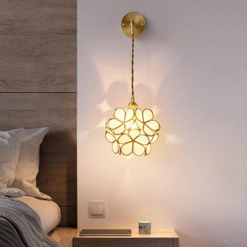 Lámpara de pared design LED con varios tréboles de cristal y metal