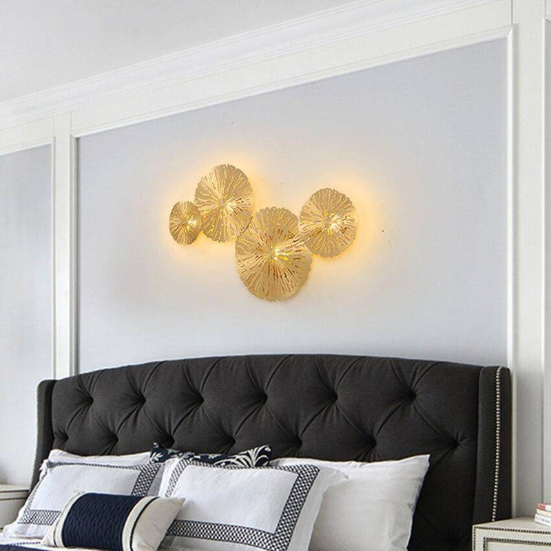 Applique murale design LED avec plusieurs disques doré ou cuivré style fleurs