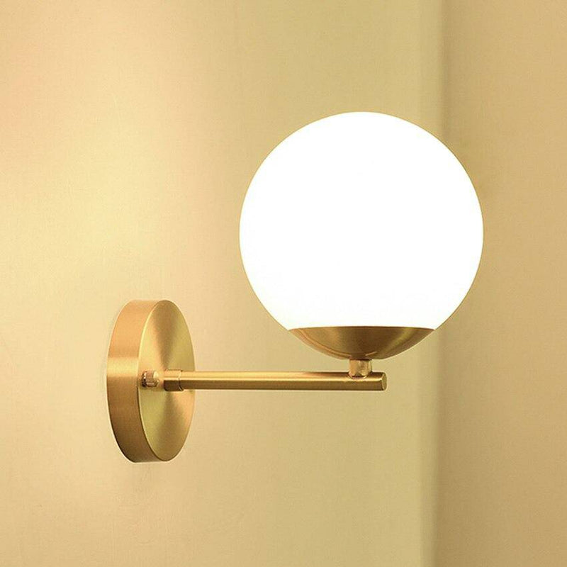 Lámpara de pared design con LED dorado y bola de cristal Lujo