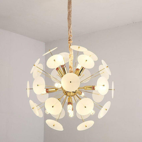 Luxury gold design chandelier and flat round smoked plates