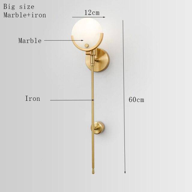 Lámpara de pared design LED con metal dorado y tallo de mármol