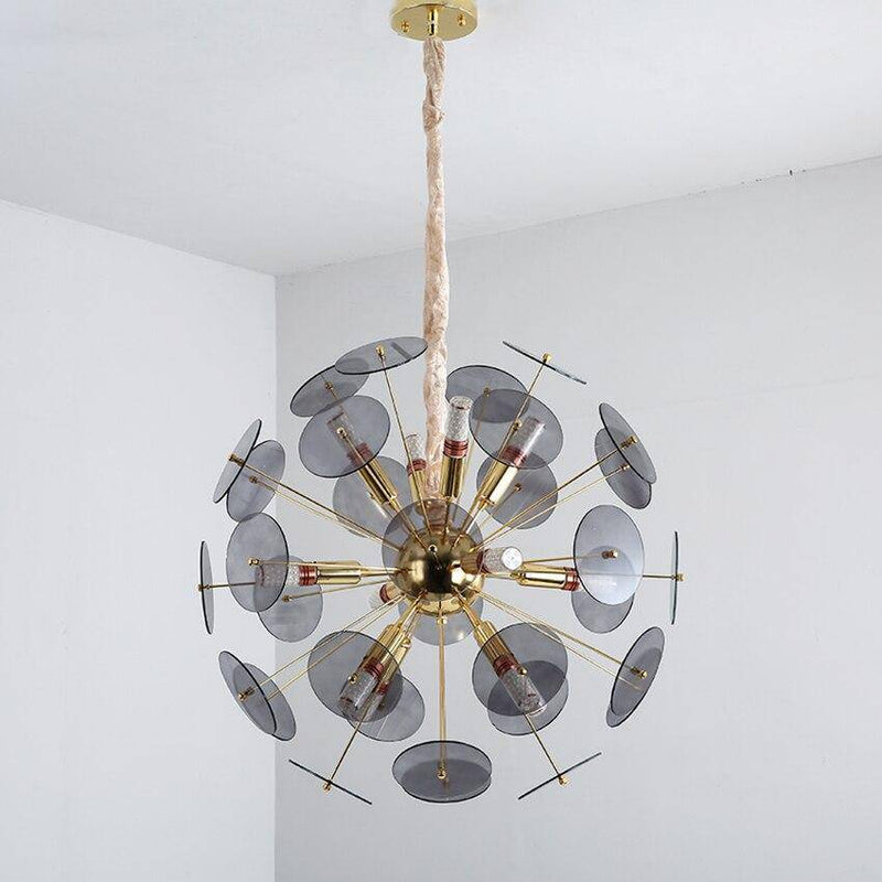 Luxury gold design chandelier and flat round smoked plates