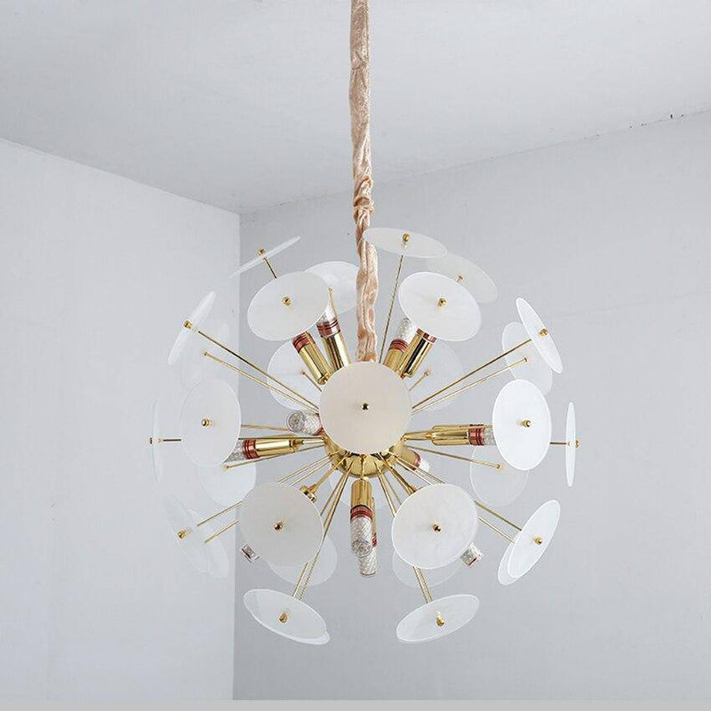 Luxury gold design chandelier and flat round smoked plates