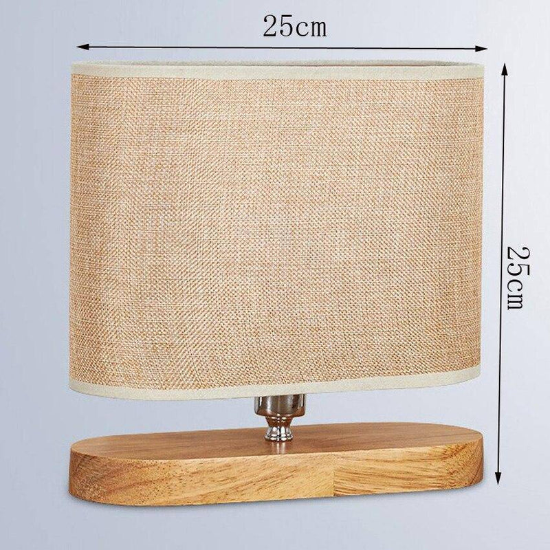 Wooden bedside lamp and lampshade in oval fabric