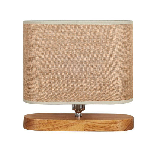 Wooden bedside lamp and lampshade in oval fabric