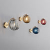 Applique murale LED doré avec boule en verre fumé Scone