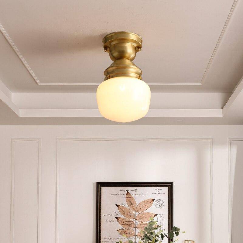 Lámpara de techo vintage con soporte dorado