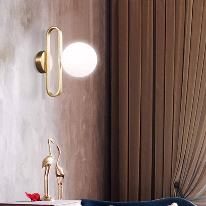 Lámpara de pared design de metal dorado con bola de cristal Retro